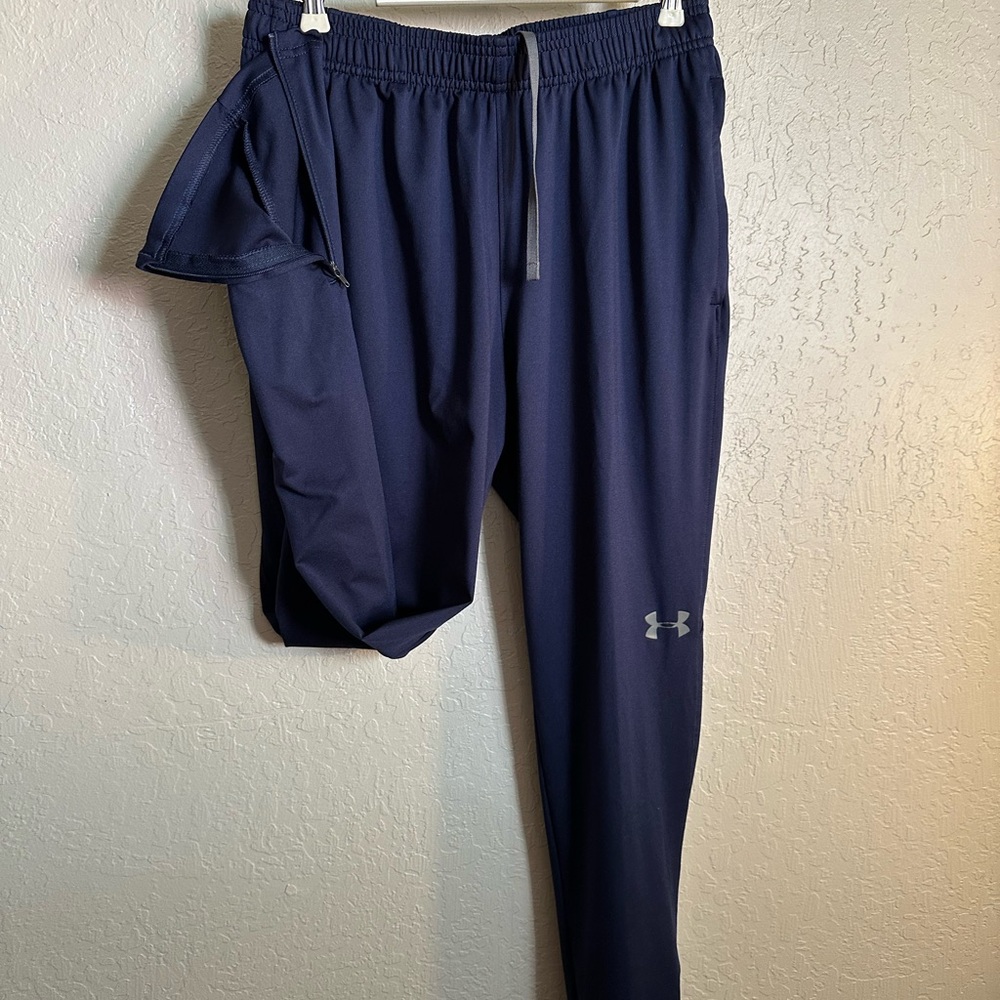 Under arm pant size medium I think they are unisex NWOT  trim fit bottom zipper